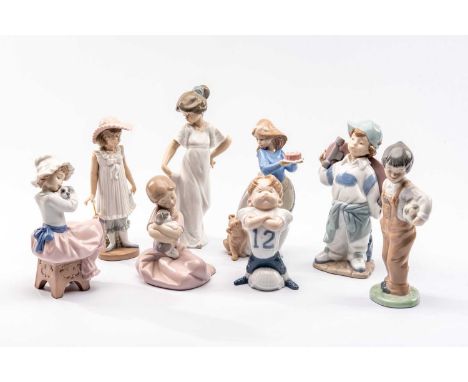 ASSORTED NAO PORCELAIN FIGURINES OF CHILDREN, comprising 'My puppy love', 'A big hug', 'I am a rock', child with umbrella, 'W
