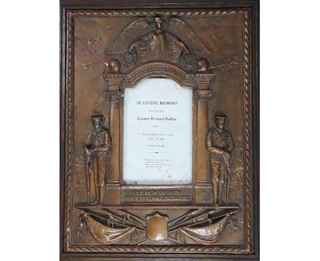 Two World War I moulded plaster commemorative frames, one for Gunner Bernard Roffey, K.I.A. 29th Sept 1918, the surround mode