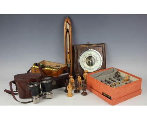 A lacquered brass travelling microscope, in mahogany case, 17cm, with a pair of racing binoculars in case, an oak barometer, 