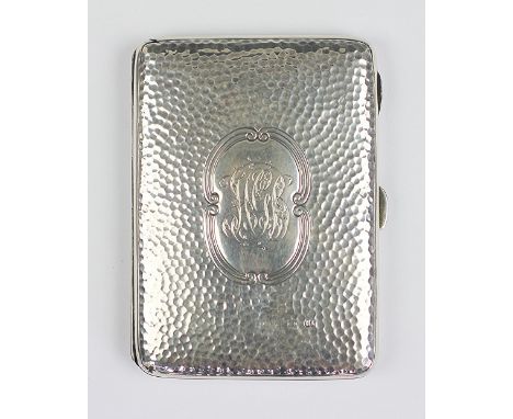 A silver aide memoire, Thomas Hayes, Birmingham 1898, the lightly planished case with central scroll cartouche (monogrammed) 