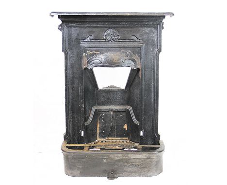An Art Nouveau fire surround decorated with sinuous detailing, 92cm H x 71cm W, along with a George III footman (2)