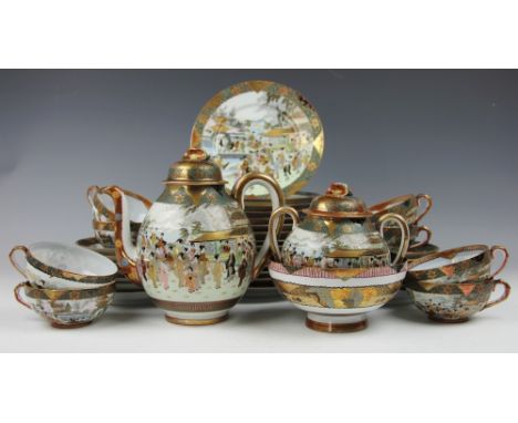 A Japanese egg shell part tea service, each piece decorated with figures in garden landscapes within richly gilded borders, c