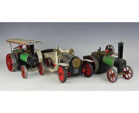 Two Mammod steam engines, in typical green, black, red and chromed livery, along with model steam vintage car in cream and re