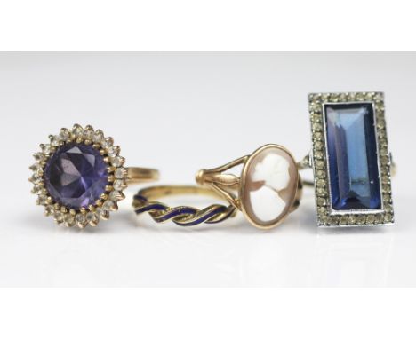 A blue enamelled 'twist' ring, stamped '585', size K/L, weight 2.5gms, along with a carved shell cameo set ring in 9ct yellow
