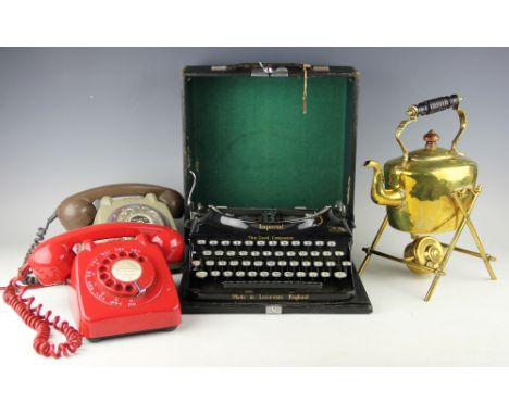 A vintage GPO 706L WR/63/2 red telephone with a further TR Services vintage telephone, along with an Imperial 'The Good Compa