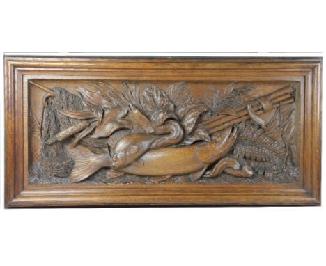 Thomas Henry Kendall (1837-1919), A large carved oak plaque / panel, worked in high relief with a pike, an eel, two other fis
