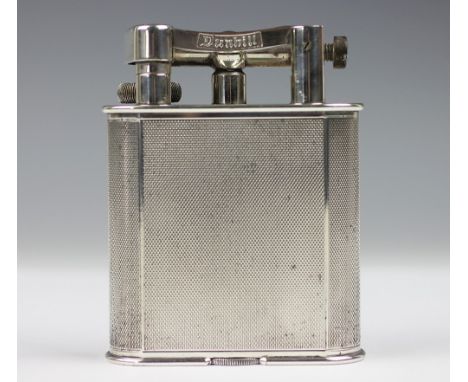 A Dunhill 'Giant' silver plated lighter, the body with engine turned decoration and stamped to the base, 'Dunhill Reg'd Desig