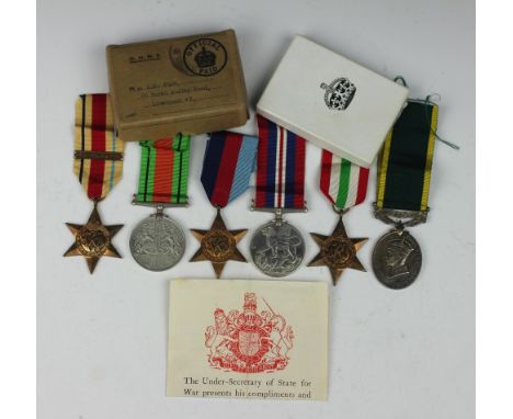 A World War II medal group to 7895512 Tpr K M Egan, comprising, 1939-45 Star, Italy Star, Africa Star, War Medal and Defence 