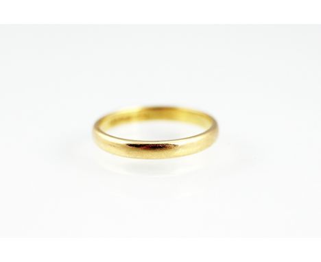 A 22ct yellow gold wedding band, size J/K, weight 2.4gms 