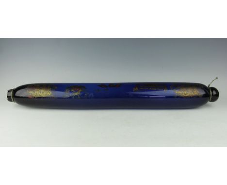 A large Bristol blue glass rolling pin, 19th century, decorated with applied Maritime images of masted ships and verses inclu