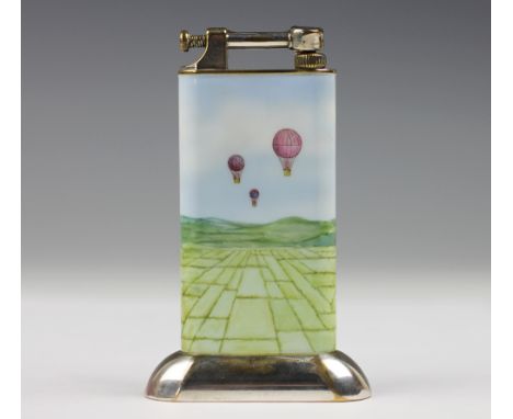 A Dunhill hot air balloon enamelled table lighter, the silver plated mounts stamped 'Dunhill' and 'Reg No 737418', the slende