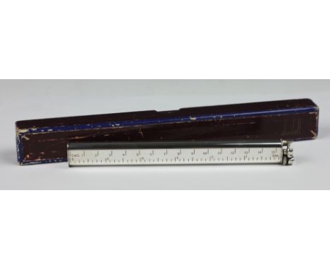 A Dunhill Sylph novelty silver plated lighter in the form of a 6 inch ruler, the base stamped 'Sylph Dunhill', 16.5cm long 