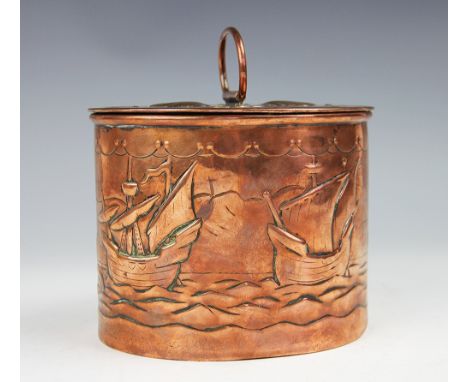 A Newlyn School Arts and Crafts copper biscuit barrel and cover, the oval, straight sided barrel embossed with galleons at se