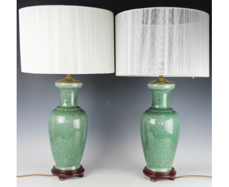 A pair of Chinese style celadon glaze craquelure lamp bases, each of high shouldered form, 43.5cm high excluding fittings, ea