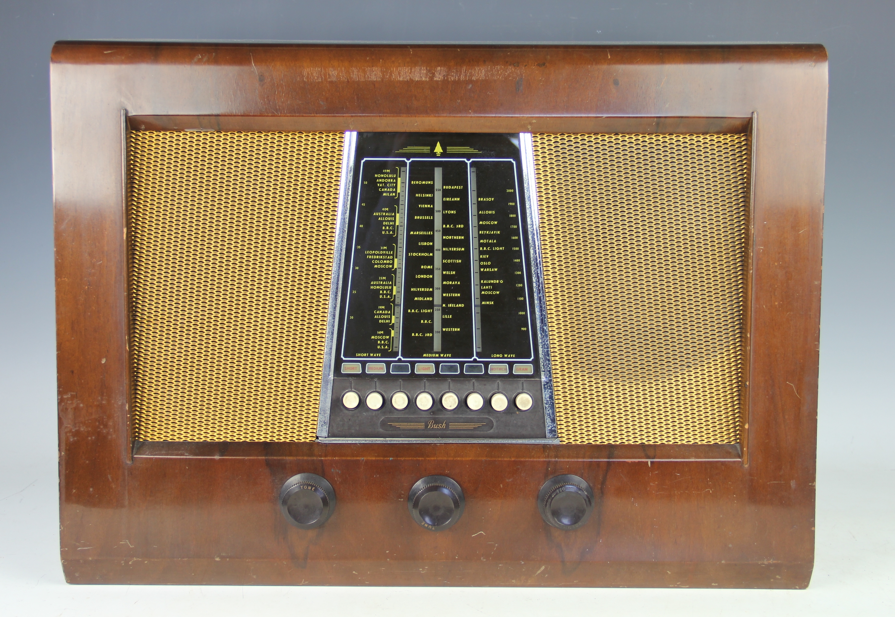 A large 1950's Bush radio, type P.B.22, the walnut case with a central ...