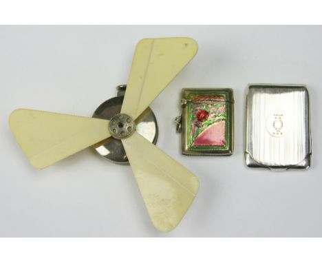 A silver vesta William Neale, Birmingham 1926, with engine turned decoration and engraved, along with a late 19th century lad