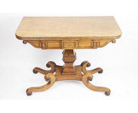 A Regency mahogany card table, on shaped square column, platform and out-swept scroll legs, 67cm H x 91cm W x 46cm D