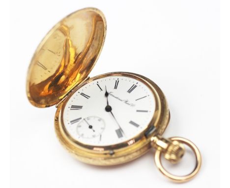 An International Watch Co 18K gold full hunter pocket watch, the case with decorative floral and mask detailing, revealing wh