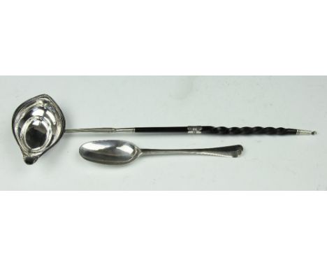 A George III silver toddy ladle with turned baleen handle 38cm long, and a George II silver spoon London 1743, initialled 'MD