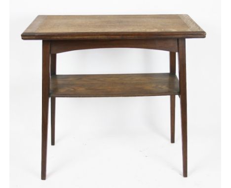 An Edwardian oak card table, with fold over top, on tapered legs, 74cm H x 76cm W x 38cm D