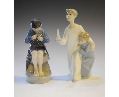 Royal Copenhagen figure - The Whittler, base with printed and painted marks and number 905, together with a Nao figure depict