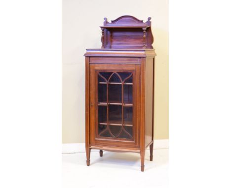 Edwardian inlaid and crossbanded mahogany side cabinet, the raised back fitted an open shelf supported by turned pillars, the