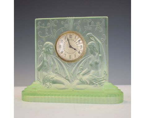 1930's period green moulded glass mantel clock having decoration in relief depicting two lady dancers   Condition: 