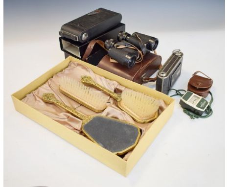 Gilt metal brush set, Kodak 1A folding camera, one other and a pair of binoculars   Condition: 