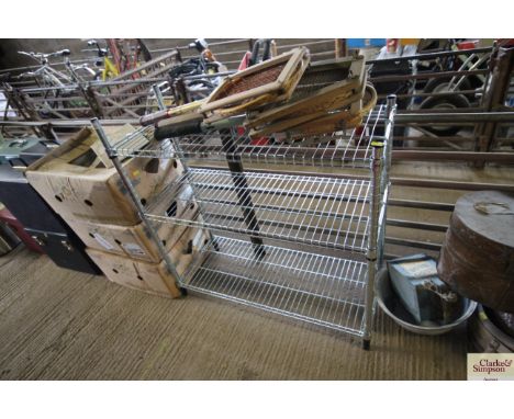 An adjustable metal three tier shelf