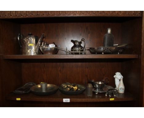 A quantity of silver plated ware, cherub decorated candlestick etc.
