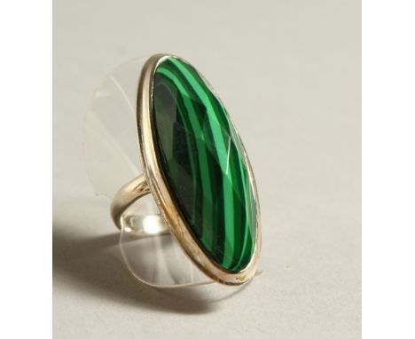 A SILVER AND MALACHITE RING.