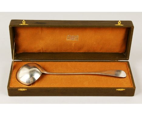 A CHRISTOFLE  LADLE, boxed. 32cms long.