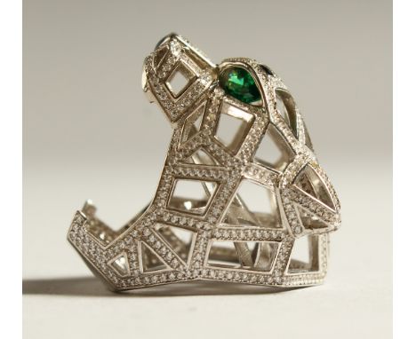 A SILVER PANTHER DESIGNER RING.