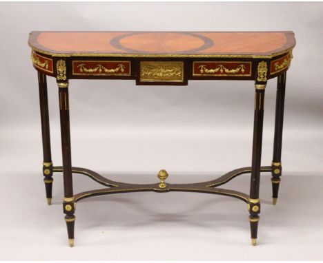 A FRENCH STYLE MAHOGANY AND ORMOLU CONSOLE TABLE, the fluted legs united by an "X" shaped stretcher. 120cm wide x 89cm high x