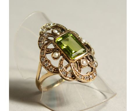 A 9CT GOLD SQUARE CUT PERIDOT, PEARL AND DIAMOND RING.