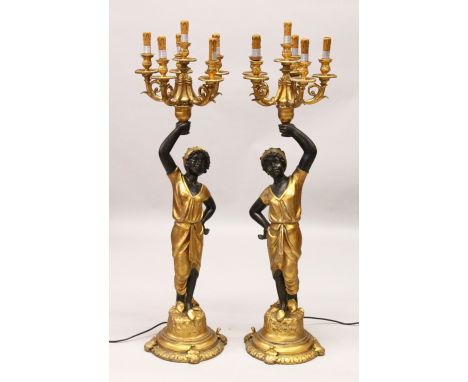 A PAIR OF BLACKAMOOR SIX LIGHT CANDELABRA. 12Ocm high.