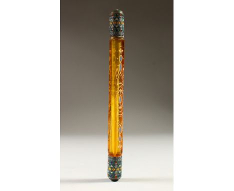 A LONG VICTORIAN AMBER GLASS DOUBLE ENDED SCENT BOTTLE with enamel ends. 20cms long.