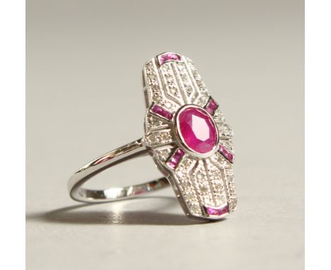 A 9CT GOLD, DIAMOND AND RUBY DECO STYLE RING.