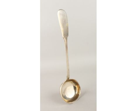 A RUSSIAN SILVER LADLE. 35cms long.