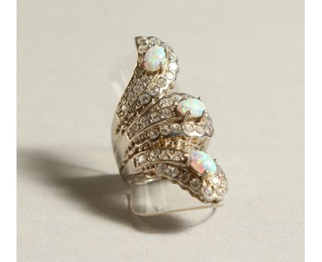 A SILVER, OPAL AND CZ RING.