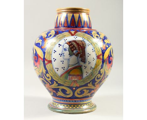 AN ITALIAN LUSTRE DECORATED BULBOUS VASE, with a portrait bust painted to each side. 31cm high.