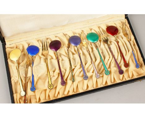 O. H. RASMUSSEN, A GOOD CASED SET OF SIX SILVER AND ENAMEL SPOONS AND FORKS.David-Andersen, Norway