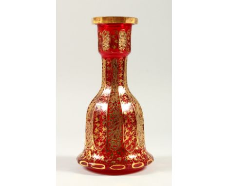 A GOOD BOHEMIAN RUBY AND GILT DECORATED BELL SHAPED DECANTER. 27cm high.