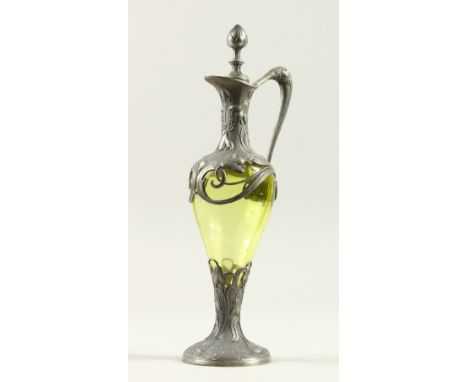 AN ART NOUVEAU TINTED GLASS AND PEWTER JUG AND COVER. 29cm high.