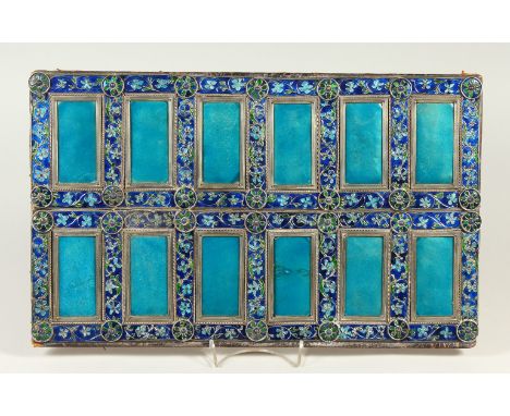 A VERY FINE BLUE ENAMEL AND SILVER PANEL, POSSIBLY RUSSIAN, with two rows of  six enamel panels with scrolling leaf design. 2