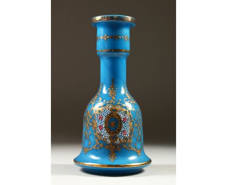 A GOOD CONTINENTAL BLUE BELL SHAPED DECANTER, with gilt decoration and white enamel. 27cm high.