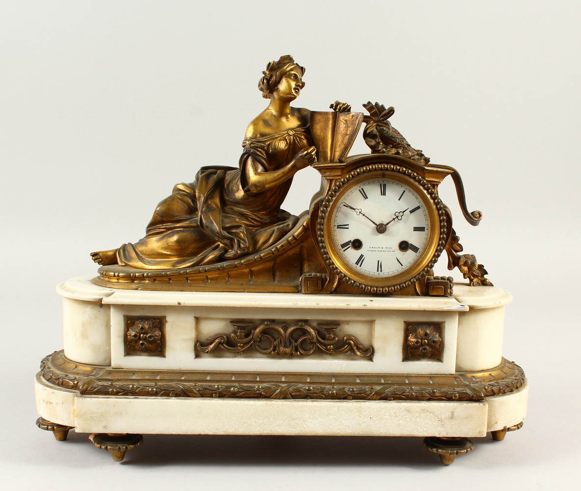 A 19th Century French Ormolu And Marble Mantle Clock Mounted With A Reclining Female Figure Read 8428