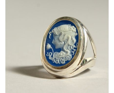 A SILVER CAMEO RING.