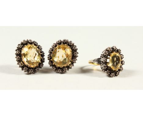 A GOOD PAIR OF CITRINE EAR CLIPS and MATCHING RING.