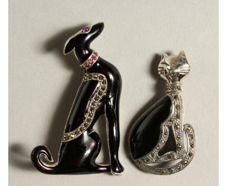 TWO SILVER AND ENAMEL RUBY SET DECO STYLE CAT AND DOG BROOCHES.